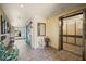Hallway with elevator, decorated with flowers and furniture, and well-maintained at 2960 59Th S St # 615, Gulfport, FL 33707