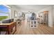 Living room with laminate floors and many windows for natural light at 2960 59Th S St # 615, Gulfport, FL 33707