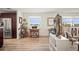 Open living room with laminate floors and view to waterfront at 2960 59Th S St # 615, Gulfport, FL 33707
