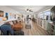 Large, bright living room with water views and comfortable seating with modern decor and flooring at 2960 59Th S St # 615, Gulfport, FL 33707