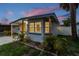 Charming home with fresh exterior paint, updated tile, and mature landscaping at 3066 Highland N St, St Petersburg, FL 33704