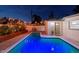 Private backyard oasis with a sparkling pool and well-manicured landscaping at 3066 Highland N St, St Petersburg, FL 33704