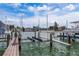 View of the boat lift featuring the lifting mechanism and surrounding waterfront at 311 Island Way # 101, Clearwater Beach, FL 33767
