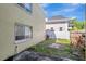 Backyard area with green space and partial fencing at 3206 W Azeele St # 126, Tampa, FL 33609