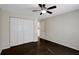 This bedroom has gorgeous dark floors, ample closet space, and a modern ceiling fan at 3206 W Azeele St # 126, Tampa, FL 33609