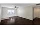Bedroom with hardwood flooring, and window with blinds at 3206 W Azeele St # 126, Tampa, FL 33609