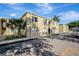 Exterior view of building with palm trees and parking area at 3206 W Azeele St # 126, Tampa, FL 33609