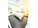 This bedroom features carpeted floors and two windows for natural light at 3318 Boca Ciega N Dr, St Petersburg, FL 33710