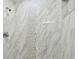 Elegant shower with marble and mosaic tile, creating a spa-like ambiance and a luxurious experience at 389 Waterford W Cir, Tarpon Springs, FL 34688