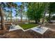 Inviting community area featuring seating and lush landscaping for peaceful outdoor enjoyment at 3918 Versailles Dr, Tampa, FL 33634