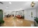 Inviting living room flows into a dining area with elegant furnishings, creating a welcoming atmosphere at 3918 Versailles Dr, Tampa, FL 33634