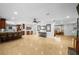 Expansive living room with a kitchen, and dining area, perfect for entertaining guests at 3918 Versailles Dr, Tampa, FL 33634