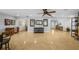 Bright, open living room featuring a large format floor, providing a seamless flow throughout the home at 3918 Versailles Dr, Tampa, FL 33634