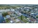 Drone view shows a home on a canal, a glimpse into the coastal neighborhood and its location near a marina at 4290 Carlos Ct, Hernando Beach, FL 34607