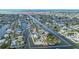 Wide aerial shot showing the home's location on a canal leading to the Gulf of Mexico at 4290 Carlos Ct, Hernando Beach, FL 34607