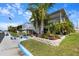 Beautiful waterfront home with a landscaped yard and multi-level deck at 4290 Carlos Ct, Hernando Beach, FL 34607