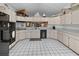 Spacious kitchen featuring stainless steel appliances, light cabinets and an abundance of counter space at 4290 Carlos Ct, Hernando Beach, FL 34607
