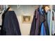 Close up of laundry hook up with jackets surrounding it at 4290 Carlos Ct, Hernando Beach, FL 34607