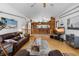 Open-concept living room with a nautical theme and convenient bar seating at 4290 Carlos Ct, Hernando Beach, FL 34607