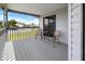Relaxing porch with chairs, perfect for enjoying quiet moments outdoors at 4290 Carlos Ct, Hernando Beach, FL 34607