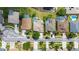 Aerial view of homes in neighborhood, showcasing street, and well-manicured lawns at 4608 Kilcoyne Ct, Lutz, FL 33558