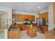 Well-equipped kitchen with stainless steel appliances, granite countertops, and center island at 4608 Kilcoyne Ct, Lutz, FL 33558