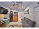 Multi-purpose bonus bedroom features ample storage and neutral tile at 4961 Marble Springs Cir, Wimauma, FL 33598