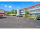 Condominium building with ample parking in a well-maintained parking lot at 5660 80Th N St # D207, St Petersburg, FL 33709