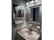 Bathroom featuring a vanity, sink, and medicine cabinet at 5875 18Th N St # 19, St Petersburg, FL 33714