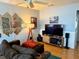 Comfortable living room featuring cozy furniture, hardwood floors, and decorative elements at 5875 18Th N St # 19, St Petersburg, FL 33714