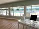 Bright lobby area offering views of the pool with ample seating and information at 5875 18Th N St # 19, St Petersburg, FL 33714