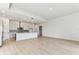 Spacious, bright kitchen featuring modern cabinets, stainless steel appliances, and an open design at 5979 Hidden Branch Dr, Apollo Beach, FL 33572