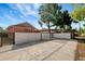 Spacious backyard with an iron gate for easy access at 6414 N Central Ave, Tampa, FL 33604