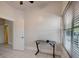 Bedroom with tile floors and a large window at 6414 N Central Ave, Tampa, FL 33604