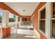 Covered porch perfect for relaxing and enjoying the neighborhood views at 6414 N Central Ave, Tampa, FL 33604