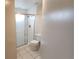 Clean bathroom showcasing a glass-enclosed shower and modern fixtures at 6618 Pineview Ter # 6618, Bradenton, FL 34203