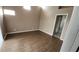 Neutral bedroom with sleek wood floors and ample natural light; a serene retreat at 6618 Pineview Ter # 6618, Bradenton, FL 34203