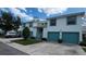 Well-maintained condo building with two-car garages and attractive landscaping at 6618 Pineview Ter # 6618, Bradenton, FL 34203