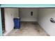 Clean garage with painted walls and concrete flooring, ready for parking and storage at 6618 Pineview Ter # 6618, Bradenton, FL 34203