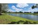 Scenic view of a beautiful golf course and pond on a sunny day at 6618 Pineview Ter # 6618, Bradenton, FL 34203