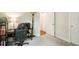 Modernly furnished bedroom with desk and ample natural light at 10815 Windswept Garden Way, Tampa, FL 33647
