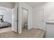 This bathroom has tile floors, a toilet in a separate room, and a doorway to the bedroom at 10937 Penny Gale Loop, San Antonio, FL 33576