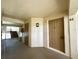 Building D2 hallway featuring multiple units with access to a stairwell at 1423 Pine Glen Ln # D2, Tarpon Springs, FL 34688