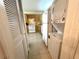 Eat-in kitchen space includes a refrigerator, stove, and washer/dryer combination appliance set at 1423 Pine Glen Ln # D2, Tarpon Springs, FL 34688