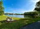 Scenic view of the lake and fountain on a sunny day at 1423 Pine Glen Ln # D2, Tarpon Springs, FL 34688