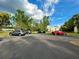 Well-maintained parking lot with ample space for residents and guests at 1423 Pine Glen Ln # D2, Tarpon Springs, FL 34688
