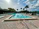 Well-maintained community pool with clear water and convenient access at 1423 Pine Glen Ln # D2, Tarpon Springs, FL 34688