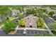 Overhead shot of a community center and pool, surrounded by palm trees and parking at 2009 River Turia Cir, Riverview, FL 33578