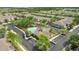 Overhead shot of a community center and pool surrounded by palm trees and parking spaces at 2009 River Turia Cir, Riverview, FL 33578