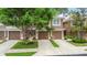 Charming two-story townhome with a well-manicured lawn and attached garage at 2009 River Turia Cir, Riverview, FL 33578